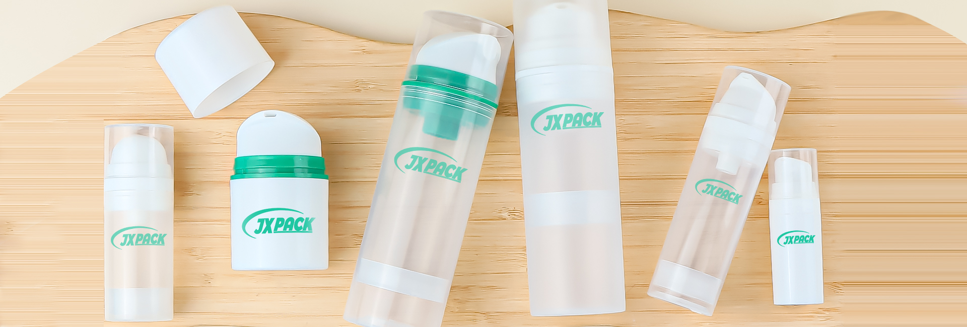 Professional arrangement of beauty products including dropper bottles and cosmetic containers in warm lighting